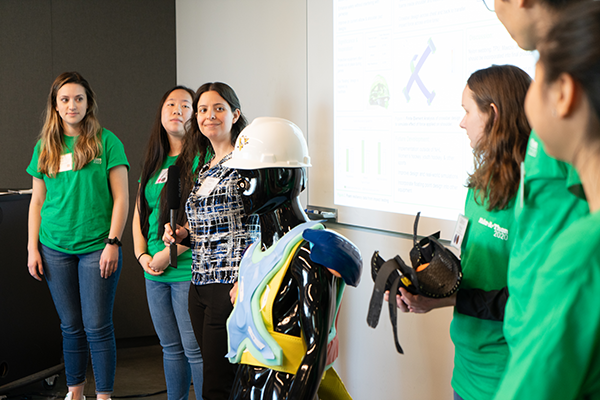 Blue team students demonstrate protective equipment