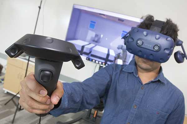Student wearing a VR mask.